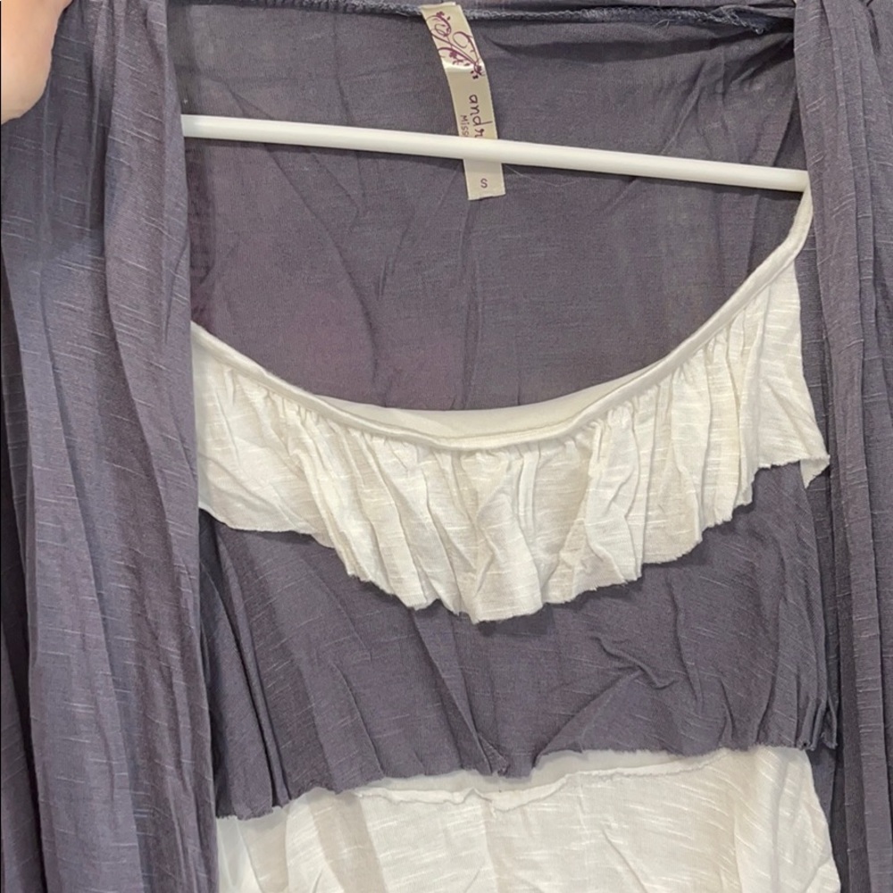 Soft flowy blouse, look of a cardigan.